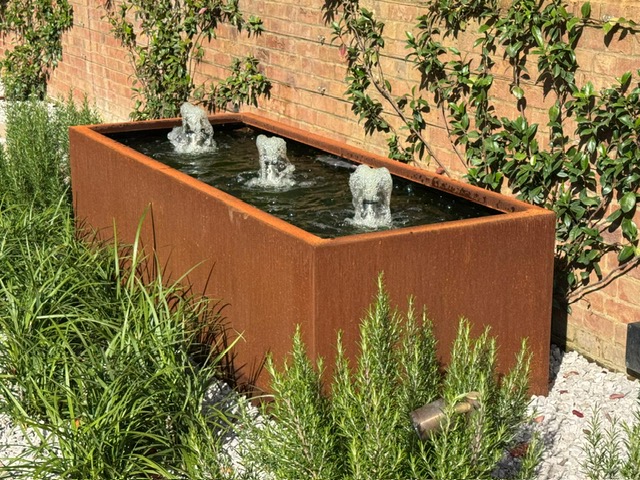 corten steel trough with bubble jets